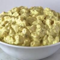 Traditional Potato Salad · Potatoes, chopped boiled eggs, onion, and red bell pepper tossed with a mayonnaise and vineg...