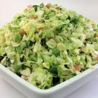 Summer Slaw Salad · Crisp, sweet, summer crunch made up of diced green cabbage, diced tomatoes, green onion, and...