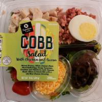 Signature Cafe Cobb Salad (10Oz) · Spring mix, white meat chicken, eggs, olives, bacon, monterey jack-colby cheese, carrots wit...
