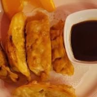 Pot Stickers (6 Pcs.) · Fried dumplings stuffed with chicken and veggies served with tangy-sweet soy.