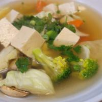 Veggie & Tofu Soup · Mixed vegetables and tofu in aromatic mushroom broth.
