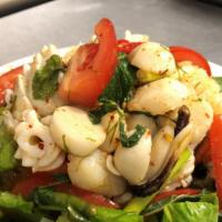 Spicy Seafood Salad · Combination seafood seasoned with spicy lime dressing.