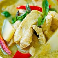 Green Curry · Thai green curry with coconut milk, bamboo, eggplants, pepper & basil.