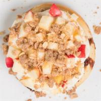Caramel Apple Pie Roll · Caramel frosting topped with fresh Apples, Pecans, Pie Crumble & Caramel Sauce.