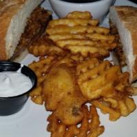 Halibut Sandwich · Beer battered halibut served on a French roll with tomato, lettuce, red onion, and tartar sa...