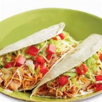 Dos Tacos · 2 tacos on your choice of soft corn, or soft flour taco shell piled high with your choice of...