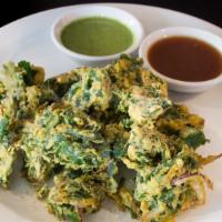 Spinach Pakora · Gluten-free. Vegan. Fritters made with fresh ginger, onion, curry leaf, spinach and chickpea...
