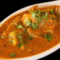 Vindaloo · Spicy curry made with vinegar, red chillies paste, ginger, cumin and potato.