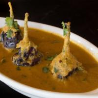Gutti Vankaya Curry · Indian eggplant in creamy peanut coconut, sesame sauce, a specialty from Andhra Pradesh. (Ve...
