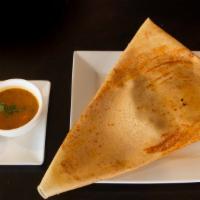 Chicken Tikka Dosa · Dosa is filled with medium spiced tender chicken tikka cooked in the tandoori oven.