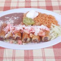 Taquitos Rancheros · Beef or chicken only. With guacamole, sour cream, rice and beans, cheese & tomato.