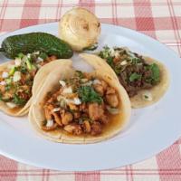 Taco (1) · Includes onions, salsa & cilantro. Boiled onion and jalapeno pepper upon request.