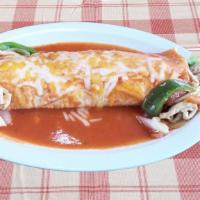 Burrito Fajita · Includes rice, bean, onions, bell peppers, tomato, cheese & special sauce. Beef or chicken.