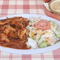 Arroz Con Pollo · Rice & chicken with onions, salad & mushrooms in a special sauce. Choice of flour or handmad...