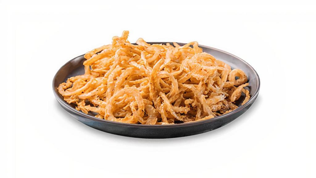 Onion Strings Appetizer · Lightly breaded and flash-fried, served with remoulade sauce.