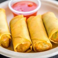 Spring Rolls (4 Pieces) · Deep fried spring rolls stuffed mixed vegetable. Served with sweet chili sauce.