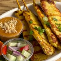 Chicken Satay (4 Pieces) · Marinated and grilled chicken. Served with peanut sauce and cucumber salad.