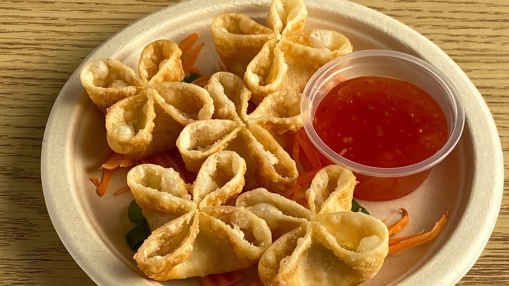 Crab Rangoon (5 Pieces) · Deep fried wonton stuffed with cream cheese and crab meat. Served with sweet chili sauce.