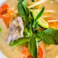 Green Curry · Choice of meat with bamboo, zucchini, bell pepper, and basil.