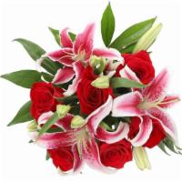 Debi Lilly Fragrant Rose · Rose and Lily bouquet, finished with greens.