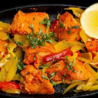 Chicken Tikka · Boneless chicken marinated in fresh ground spices and roasted.