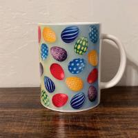 Eggspresso · Bright and bold Easter coffee mug with eggs all over it, the perfect gift from the Easter bu...