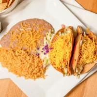 Crispy Taco · Corn tortilla (regular size), your choice of shredded beef, asada, adobada or chicken, toppe...
