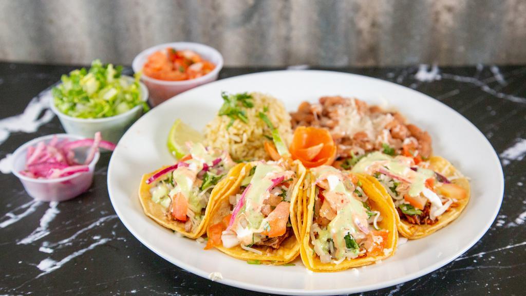 Street Tacos With Rice And Beans · 4 street tacos w/ rice and beans or 5 without rice and beans
