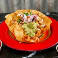 Taco Salad · Fried tortilla bowl with a bed of lettuce and choice of meat and toppings