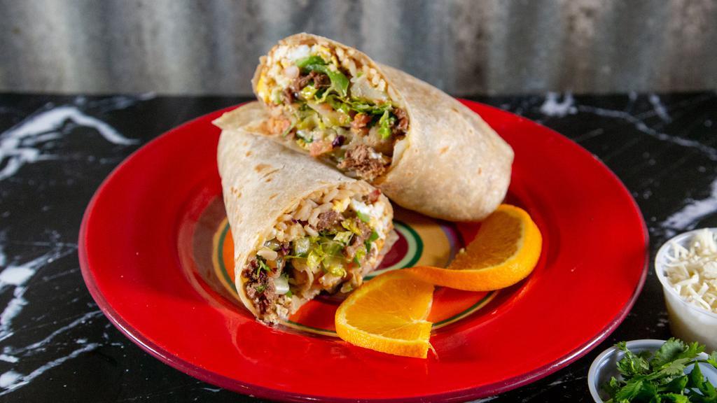 #2Breakfast Burrito · Cooked with bell peppers,onions & potatoes