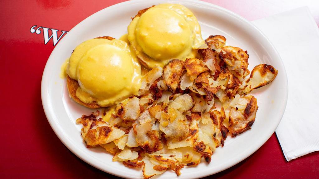 Eggs Benedict · 2 poached eggs and canadian bacon served on an english muffin, topped with our hollandaise sauce.