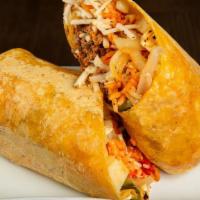 Veganator Burrito · Choice of Vegan Protein , Onion, Poblano Pepper, Red Bell Pepper, Potatoes, Corn, Rice, Vega...