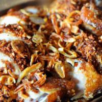Hat Yai Fried Chicken · (gai-tod-hat-yai)
Southern Thai fried chicken topped with fried garlic and shallots. A popul...