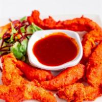 Chicken Pakora · Boneless tender chicken seasoned with chickpea flour batter pest, onions, ginger and Himalay...