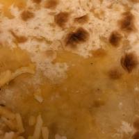 Cheese Naan · Flat puffy bread baked in tandoor.