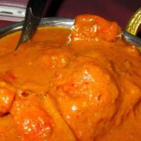 Chicken Mango Curry · Boneless chicken thigh chops cooked with fresh mango, onions, ginger, garlic, cilantro, fres...