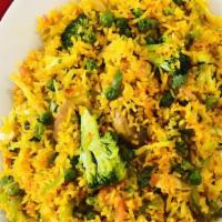 Nepali Style Fry Rice · Tried basmati rice with green vegetable, red and green peppers, and house spices.