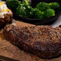 Ribeye Steak (14 Oz.) · 910 cal.