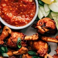 Chicken Lollipops · Tenders, grilled to perfection and served on a stick. Choice of side sauce and one kids' sid...