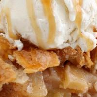 Apple Pie A La Mode · Deep dish apple pie topped with premium vanilla ice cream and hot caramel sauce. 1530 cal.