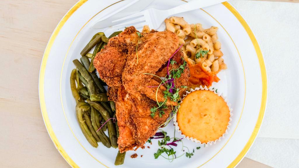 Louella'S Fried Chicken · 2 pieces of fried chicken along with 2 sides of the day and a cornbread muffin