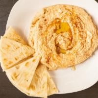 Hummus & Pita Bread · Dip made from chickpeas and unleavened flatbread.