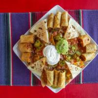 Amigo Sampler · Beef taquitos, cheese quesadillas, nachos and chicken chimis topped with pico de gallo, sour...