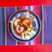 Shrimp Cocktail · A classic Mexican shrimp cocktail with shrimp, tomatoes, hot sauce, onion, cucumbers, diced ...
