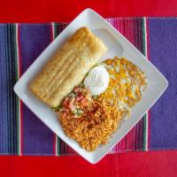 Chimichanga · Beans, cheese and your choice of meat: shredded beef, shredded chicken, ground beef, chile v...