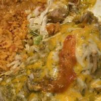 Chile Verde Burrito · Large flour tortilla stuffed with chile verde (pork), beans and cheese. Covered with green s...