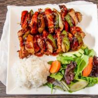 Chicken Yakitori Bento · Two chicken skewers with mushroom, green pepper, onion glazed with teriyaki sauce with two c...