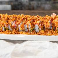 Firecracker Roll · Spicy. Crab mix, avocado, cucumber topped with crab stick, spicy mayo, eel sauce over french...