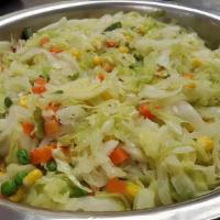 Cabbage/Mixed Vegetables · Cabbage, carrots and bell peppers saute.