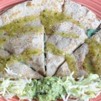 Quesadilla De Espinacas · Whole wheat tortilla filled with our Mexican cheese blend, fresh spinach, onions, mushrooms ...
